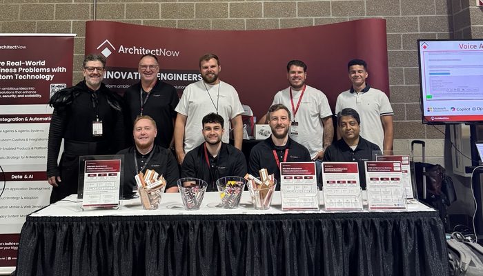 The ArchitectNow team at their dev up 2025 conference booth